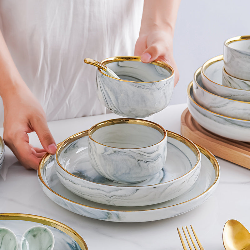 Marble-patterned ceramic tableware set with swirling patterns and gold trim. Luxurious tableware suitable for parties, weddings, and other ceramic/porcelain occasions.