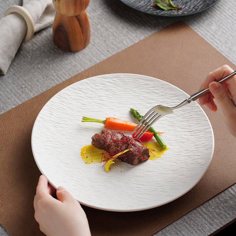 Creative and luxurious ceramic dinnerware set with a stone pattern, suitable for restaurants and homes.