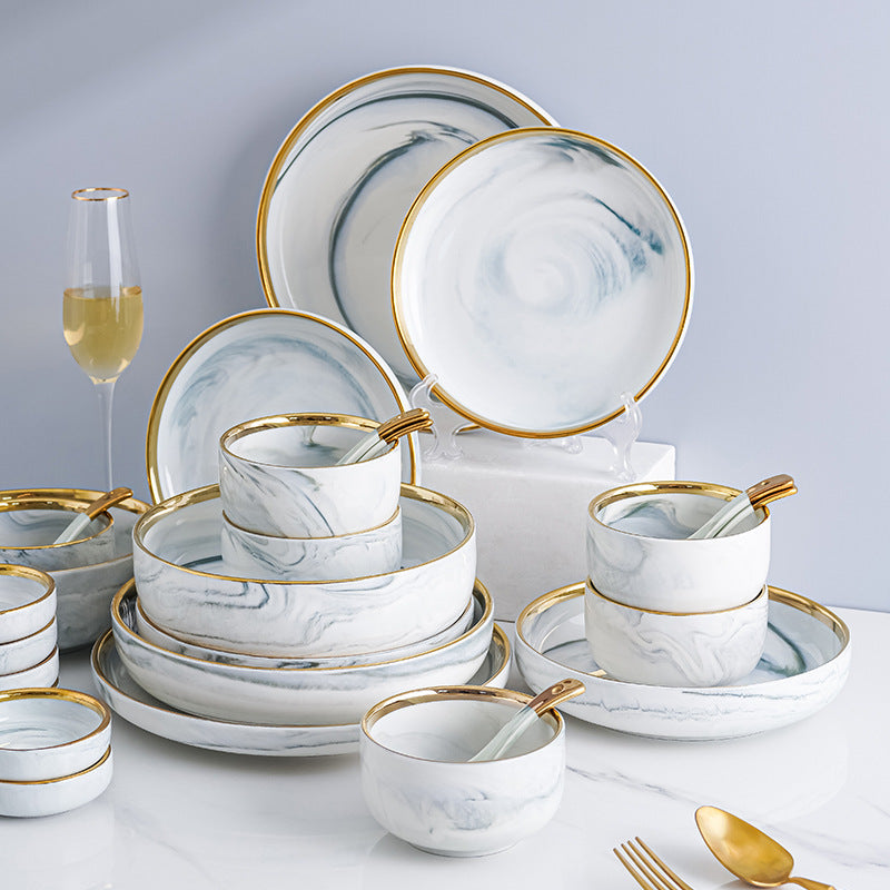 Marble-patterned ceramic tableware set with swirling patterns and gold trim. Luxurious tableware suitable for parties, weddings, and other ceramic/porcelain occasions.