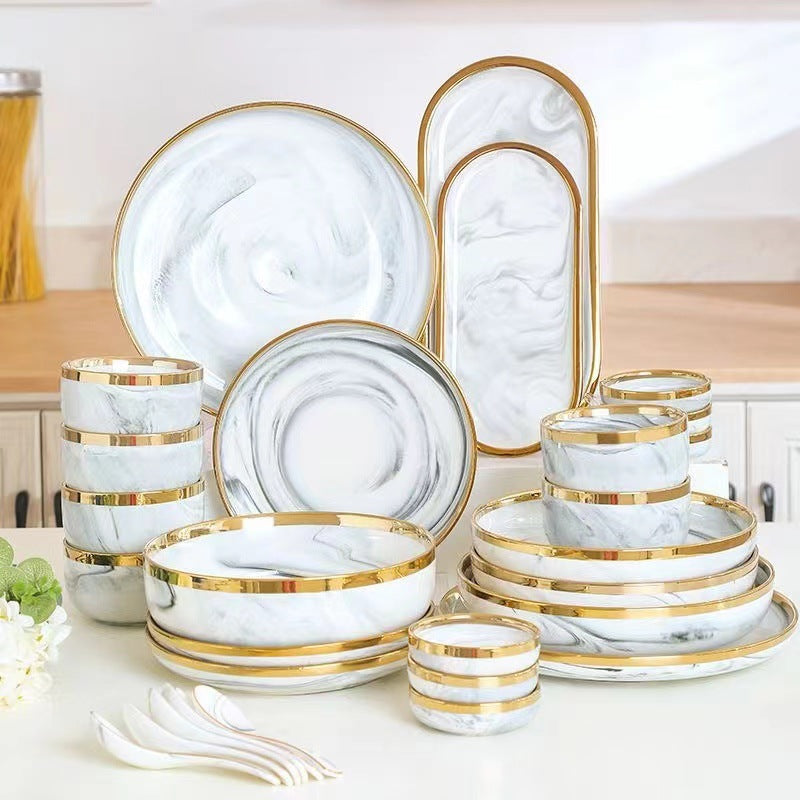 Marble-patterned ceramic tableware set with swirling patterns and gold trim. Luxurious tableware suitable for parties, weddings, and other ceramic/porcelain occasions.
